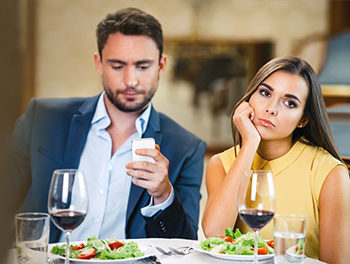 couple bored on a date