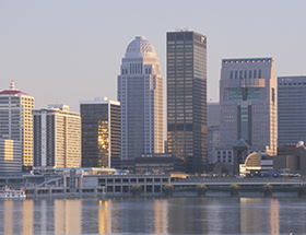 Louisville skyline reflected in the river
