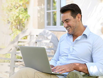 Man looking online to find a date