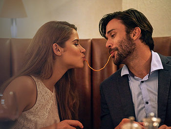 couple sharing romantic dinner