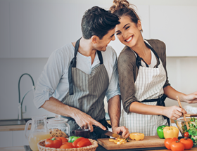 Couple cooking a vegan dinner together