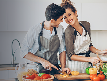 Couple cooking a vegan dinner together