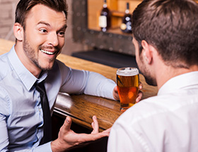 San Francisco gay couple having drink together