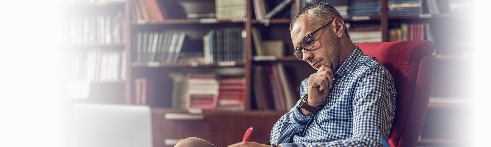 academic looking man reading