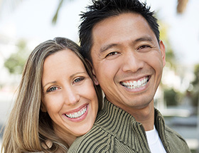 Happy Asian couple smiling