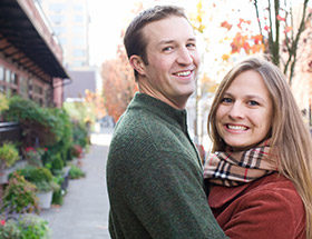 smiling couple outside