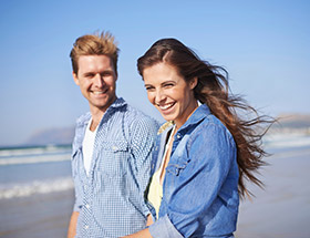 Couple walking on the beach