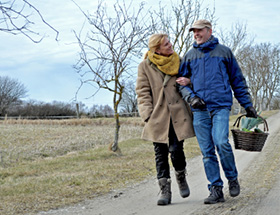 Happy older couple taking a walk after meeting on over 50 dates sites