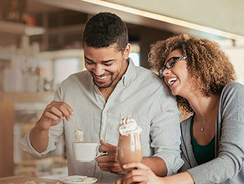 happy couple laughing on a date