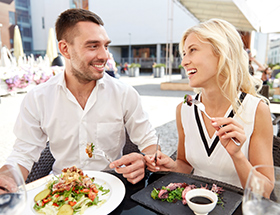 Couple having lunch in the sunshine