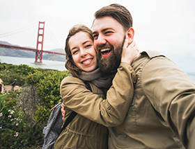 Young couple at the Golden Gate bridge