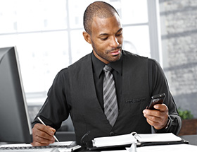 Smartly dressed black man at work