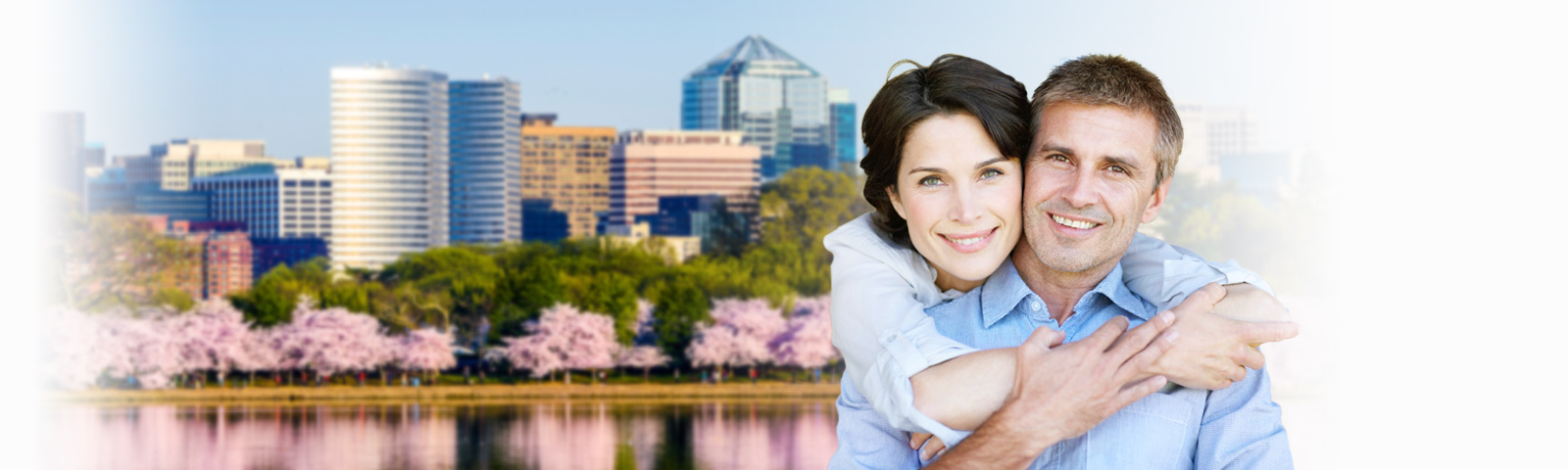 happy couples in front of Washington cityscape