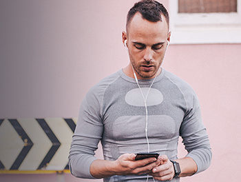 busy boyfriend out for a run texting his girlfriend