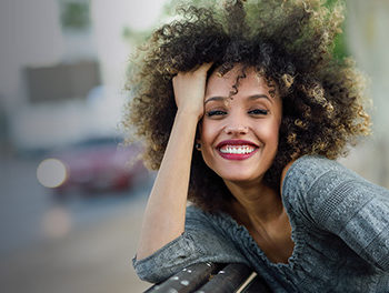 happy-smiling-woman-thinking-about-dating-an-independent-woman