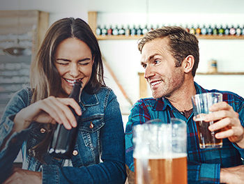 man striking up conversation after finding out how to talk to woman