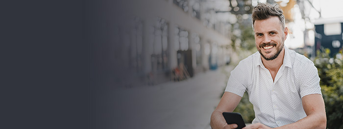 man checking out some gay dating tips on his phone