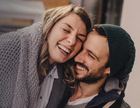 couple in a good relationship laughing together
