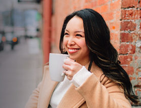 woman-enjoying-coffee-thinking-of-the-best-places-to-meet-single-women