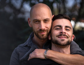 Two handsome gay guys in a new relationship